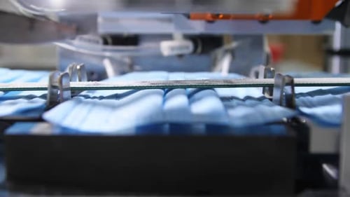 Production Line Connects Elastic Bands with Protective Masks