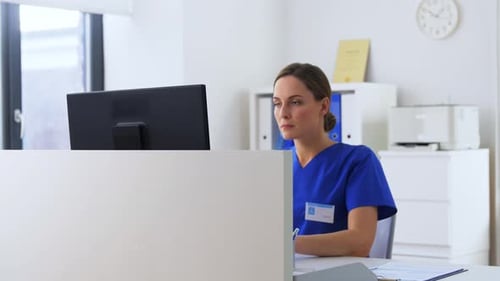 Female doctor talking to patient at hospital healthcare concept slow motion