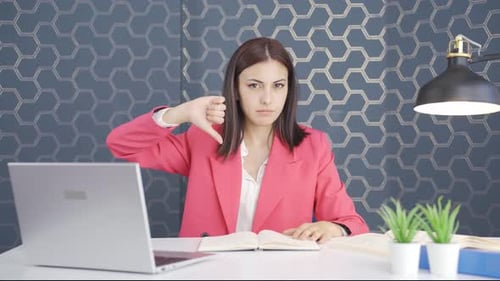 Negative young business woman.
