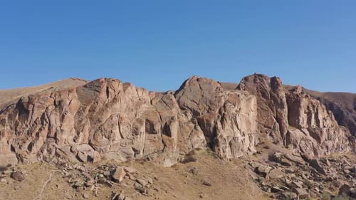 Desert Rock Formation Aerial Shot Under Blue Sky