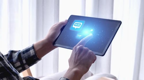 Man Using Tablet with Social Media Icons