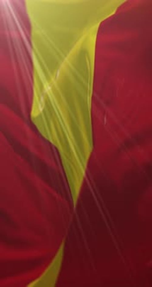 Fluid Red and Yellow Waving Flag Background Animation