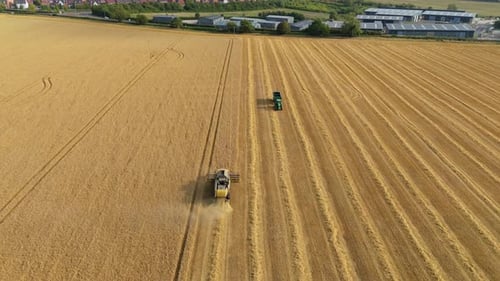 Aerial View of Harvesting in the UK Countryside