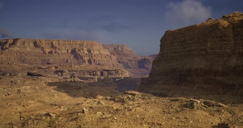Explore the Vast Beauty of Rugged Canyons in a Desert Landscape