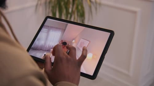 Man Sets Up CCTV Camera Using Tablet