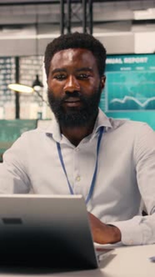 Vertical Video Black Man Worker Monetary Data Performance Review Laptop Screen
