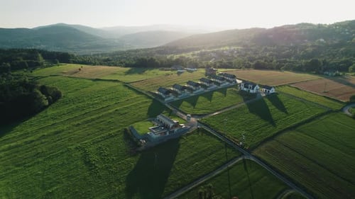 Aerial Scenic View of a New Single-Family Houses at Sunset
