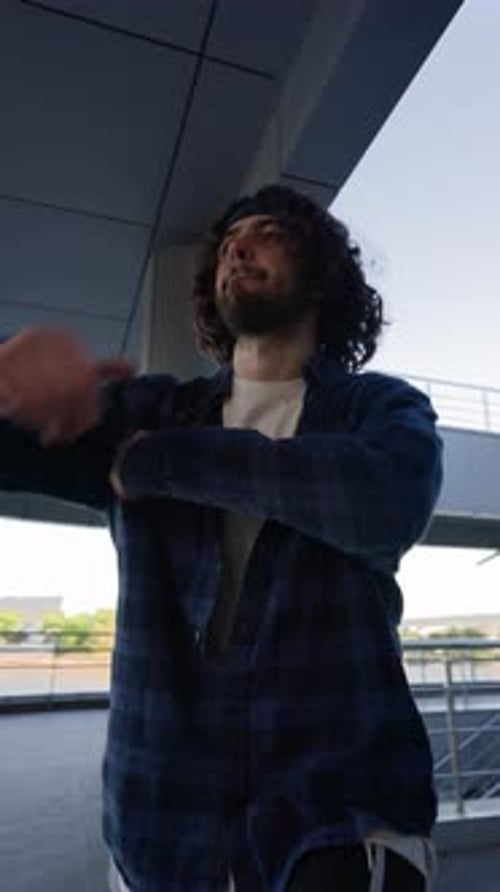 Vertical Video Stylish Male Street Dancer Dancing Hip Hop on Urban Background