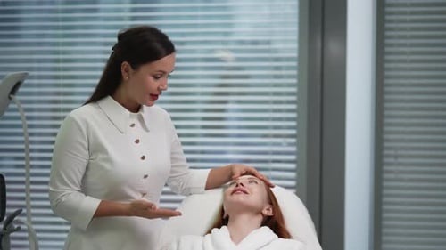 Health Professional and Patient in Examination Room