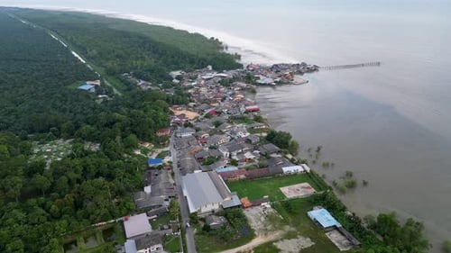 A town is located near the ocean. Aerial Segenting, Batu Pahat.