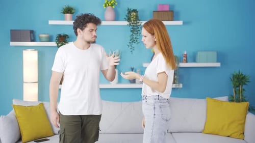 Frustrated Couple Arguing in Their Living Room