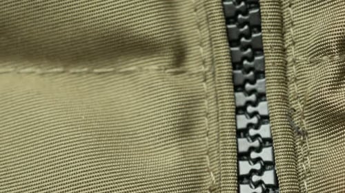 Closeup of a Zipper with a Slider