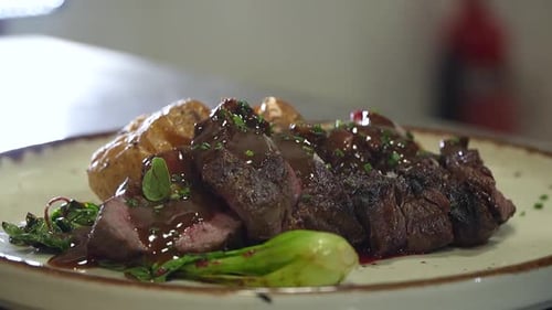 Plated Steak Meal at Restaurant Ready to Serve
