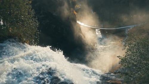 Nature's Splendor: Awe-Inspiring View of a Waterfall and Bridge in a Serene Landscape 4K