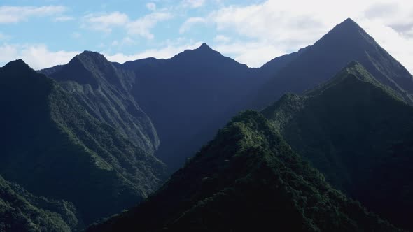 Green volcano island mountain peaks Teahupoo Tahiti French Polynesia ...