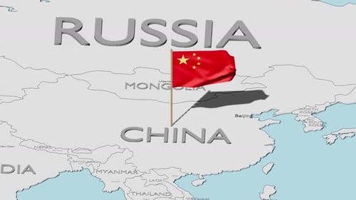 Chinesische Flagge weht mit der Weltkarte