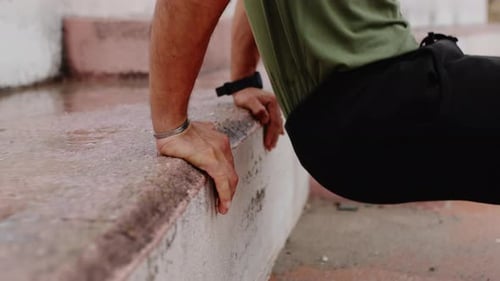 Man in Green Tshirt Exercise Sport Triceps on the Step Outdoor