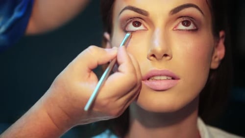 Makeup Artist Applying Eyeshadow for Beauty Make Up Model Closeup Eyes Eyeshadow Beautiful Young