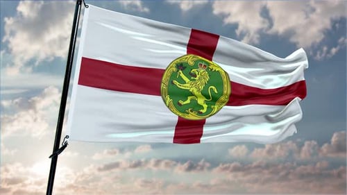 Alderney Flag Waving in Wind with Cloudy Sky Background