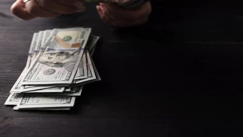 Female Hands Count Usa One Hundred Dollar Bills In Slow Motion