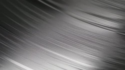 Black Retro vinyl record player Rotating. Macro. View from above. Spinning vinyl plate