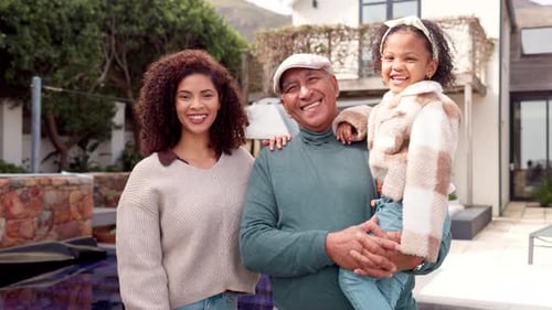 Smiling Family in Suburban Setting