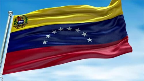 Venezuela Flag Waving Against Blue Sky