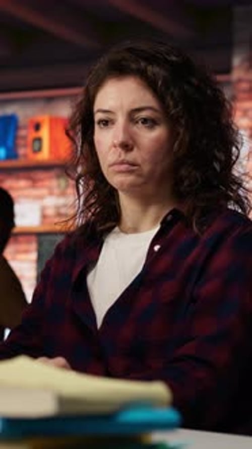 Vertical Video Woman Using PC in Startup Office to Design and Implement Algorithms