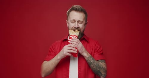 Getting satisfaction from unhealthy food. Junk food.