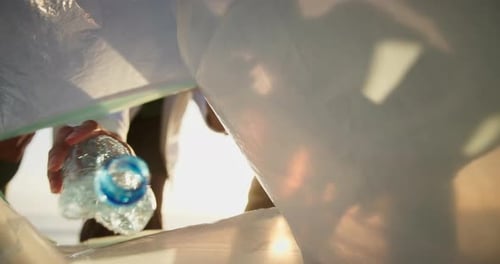 Pov, trash bag and bottles with people, hands and volunteer with sustainability