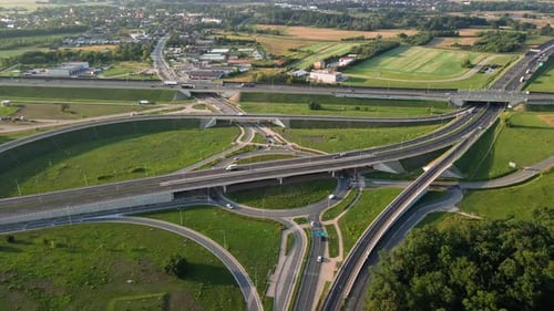 Cars Moving on Transport Road Junction in City Aerial View
