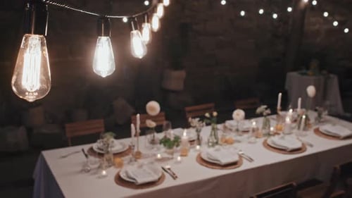 Elegant Table Setting With Vintage String Lights