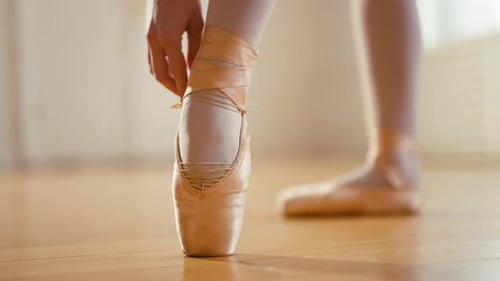 Ballerina Puts Pointe in Ballet Studio Professional Classic Ballet Dancer Preparing to Training