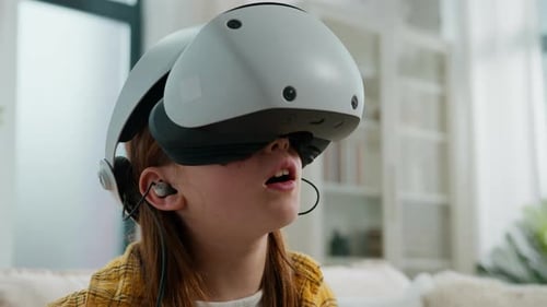 Young Girl Immersed in Virtual Reality Experience at Home