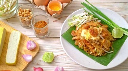 Appetizing Pad Thai Close Up on Wooden Table