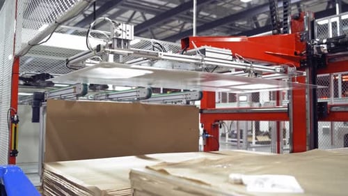 Automated factory equipment at working process.