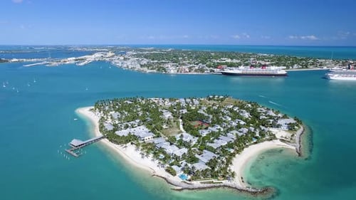 Tropical Island and Town with Cruise Ships Aerial