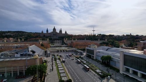 Aerial long view of Avinguda de la Reina Maria Cristina at its junction with Montjuic Palace