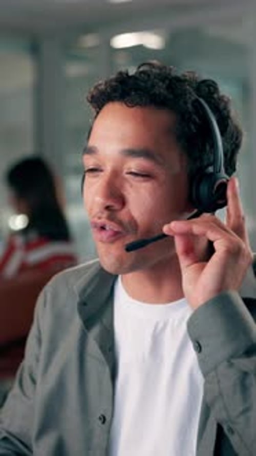 Speaking, headset and man in call center for telemarketing, customer service