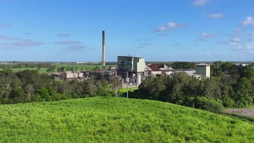 Sugar Mill Factory Next To Sugar Cane Fields