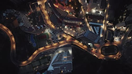 Top down aerial view of modern metropolitan city streets at night