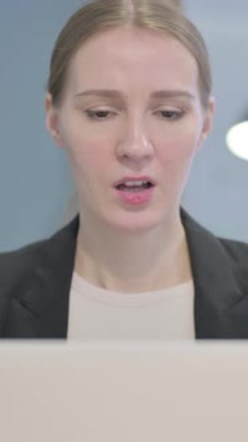 Close Up of Businesswoman having Headache while Working on Laptop, Vertical Video