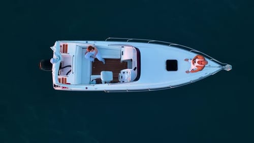 Sports Boat Sails and Makes Beautiful Turns Aerial View 4 K