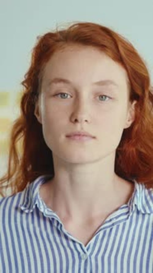Confident Woman Portrait with Arms Folded Indoors
