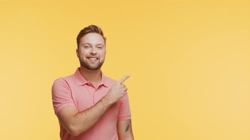 Expressive Young Man Over Vibrant Background Studio Portrait of Handsome Person