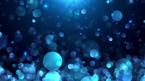 Fallende blaue Bokeh-Partikel