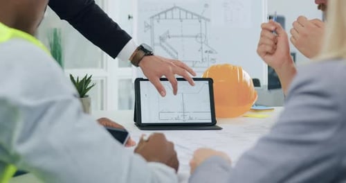 Close up of hands using digital computer with customers and contractors which revision together
