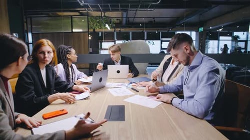 Diverse Business Team Collaborating in Modern Office