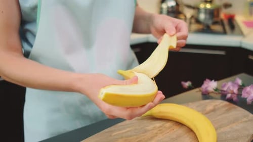 Peeling a Banana in the Kitchen