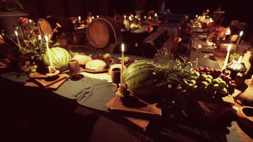 Rustic Feast Table with Candles and Abundant Food